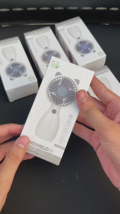 Portable USB Rechargeable Mini Handheld Fan – Lightweight Personal Cooling Fan (Random Color)